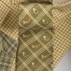 Fox and French horn on olive green silk tie