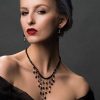 Glamorous garnet and 14ct white gold necklace and earrings set: the Medici