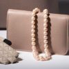 Elegant natural blush pink pearl and 14ct gold necklace: single strand: a snip at £117