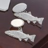 Precious links, handmade in sterling silver by an English craftsman: the salmon