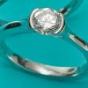 Tension-set round brilliant solitaire diamond ring