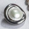 Eyecatching large natural mabé pearl and sterling silver brooch