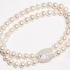 Galapagos Bracelet in natural pearls finished with a turtle in lilac quartz