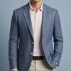 Man wearing Gurteen Naples Jacket 61001-137 Blue Melange linen blazer with pink polo shirt