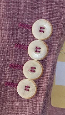 Close-up of cuff buttons and magenta contrast stitching on Gurteen Naples Jacket 61001-161