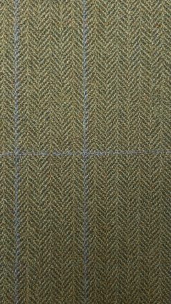 Close-up of Gurteen Blenheim pure wool tweed fabric – green herringbone weave with fine orange overcheck