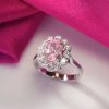 2.1ct natural Padparadscha sapphire halo ring in platinum – La Rosée d’Aurore, exclusive CountryClubuk Members' price.