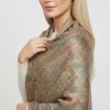 Handwoven Golden Hour paisley silk wool stole draped on model in soft golden light
