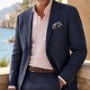 The Viago navy linen jacket by Gurteen styled for relaxed summer tailoring and coastal occasions