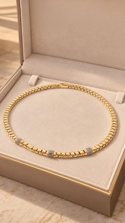 Italian 7mm gold-plated sterling silver necklace with three Swarovski crystal-set barrels displayed in its presentation box