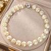 Lumina, a 17-inch cream baroque South Sea pearl necklace of 14–18 mm pearls, with a polished 14-carat white gold diamond Uniclasp, shown in its case.
